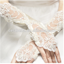 Kundenspezifischer Entwurf weg von den weißen Handgelenk-Längen-Handschuhen Fingerlose Spitze-Brauthandschuhe